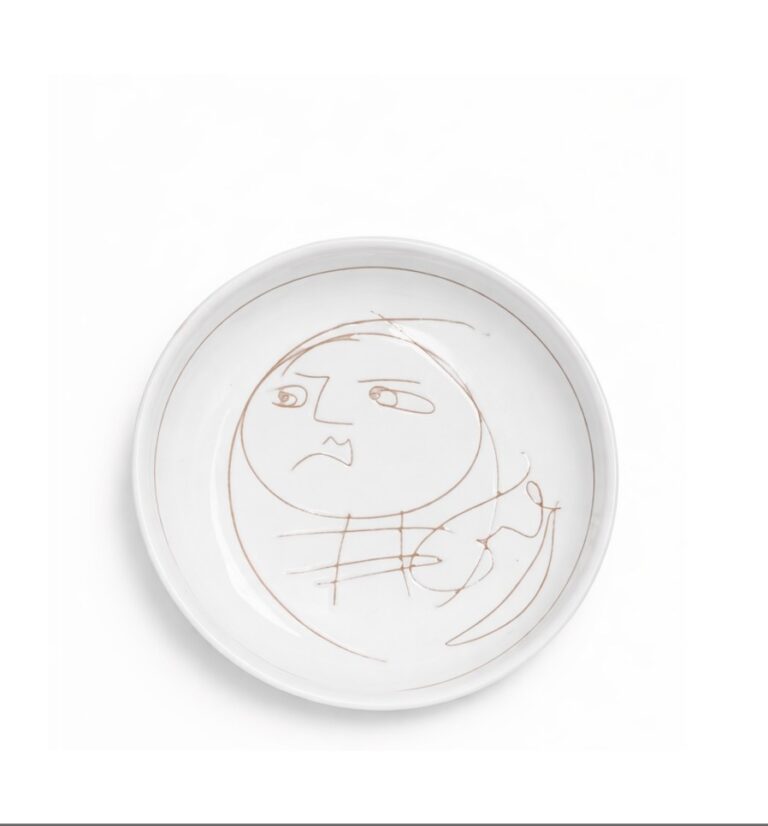 Unique ceramic plate with abstract face drawing produced in Europe